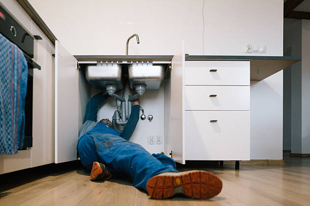 Professional Emergency Plumber technician working in Delafield, WI